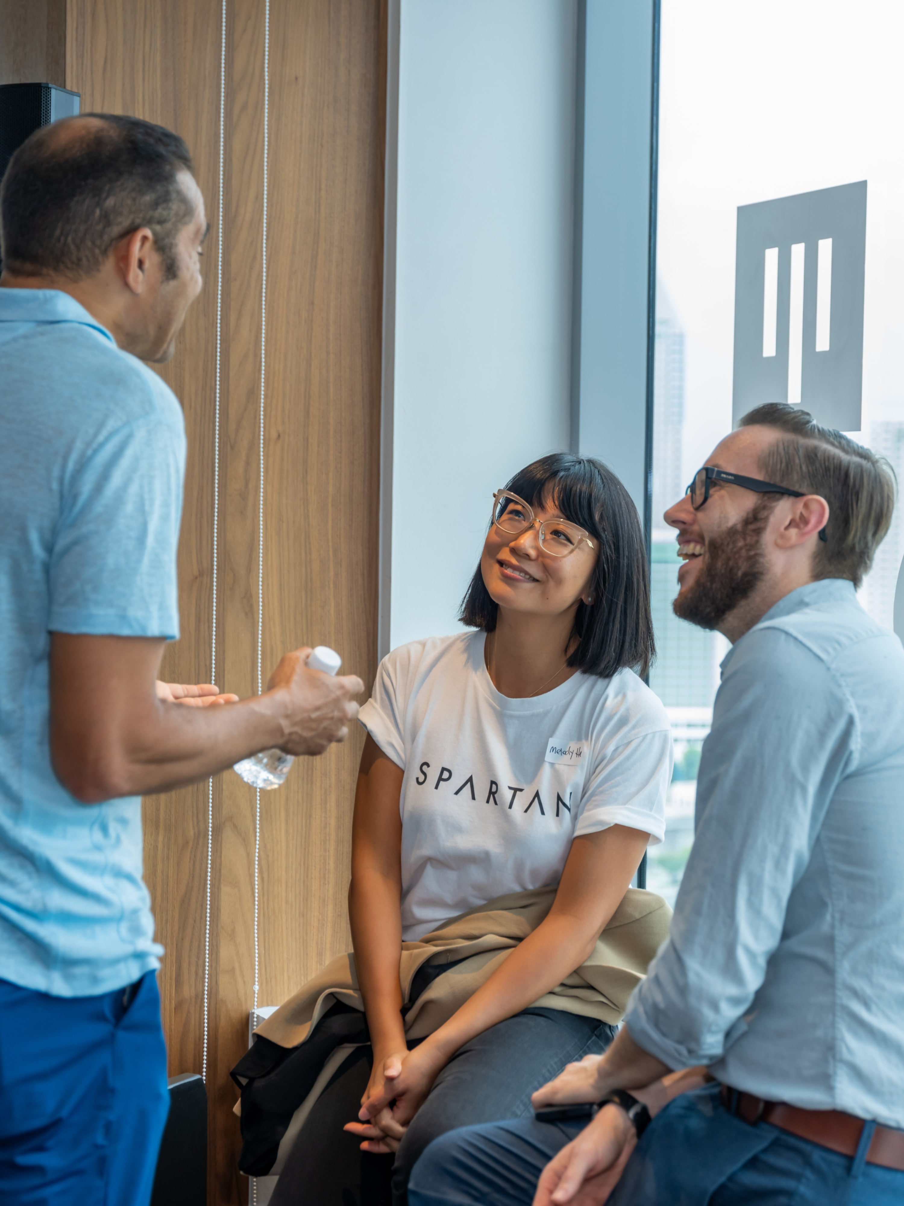 Three guests in conversation during an industry programme.